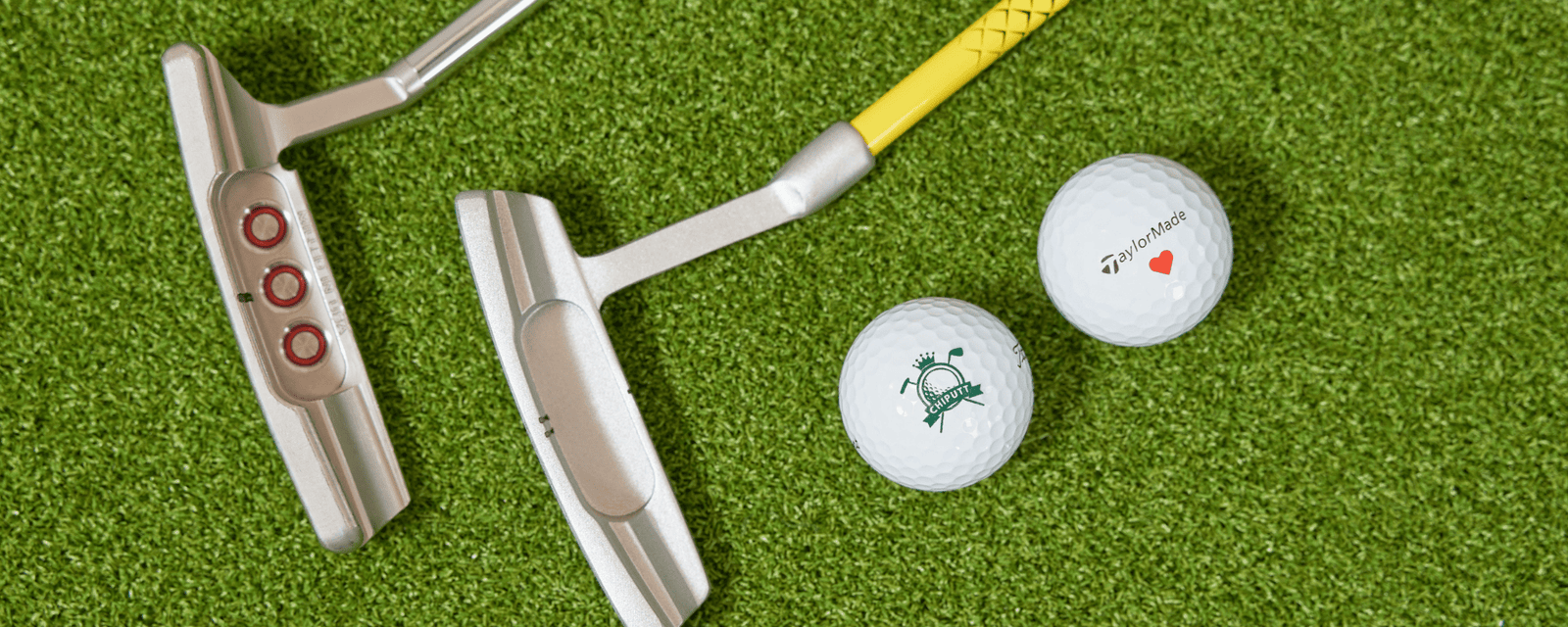 Golf tournament setup with sponsor signage, branded apparel, and promo items